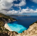 A top panoramic view at Myrtos Beach and fantastic turquoise and blue Ionian Sea water. Aerial view, summer scenery of Royalty Free Stock Photo