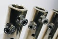 Top part of large diameter electric cable connection tubes with allen key screws, made of stainless steel Royalty Free Stock Photo