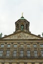 Top part of The Royal Palace in Dam Square, Amsterdam, Netherlands. Vertical