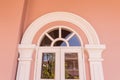 Top part of window on top of door of Chino-Portuguese architectural style Royalty Free Stock Photo