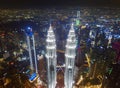 Top of Petronas Twin Towers. Aerial view of Kuala Lumpur Downtown, Malaysia. Financial district and business centers in smart Royalty Free Stock Photo