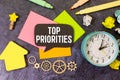 Top Priority text circled in pencil on textured paper Royalty Free Stock Photo