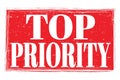 TOP PRIORITY, words on red grungy stamp sign Royalty Free Stock Photo