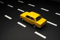 Top and rear view of a yellow colored toy model car on an asphalt road with road lanes