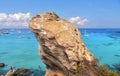 02.09.2018. the top of the rock cliff in front  of paradise clear torquoise blue water with boats and cloudy blue sky in backgroun Royalty Free Stock Photo