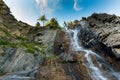 Panoramic view up at the waterfall Shirlak, Altai Republic, Russia