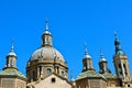 Top of the roman catholic cathedral of El Pilar against a clear blue sky Royalty Free Stock Photo