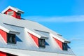 Top roof of red barn on blue sky background Royalty Free Stock Photo