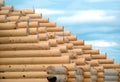 Top of rural wooden house from sandy brown smooth planed heavy pine logs in construction process Royalty Free Stock Photo