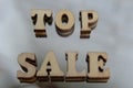 Top Sale wooden letters on a gray background for signs in the store