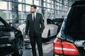 Top sales manager at dealership showroom Royalty Free Stock Photo
