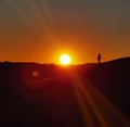 On the top of the sand dunes in an epic sunset Royalty Free Stock Photo