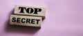 Top secret phrase made wooden blocks. Successful Trading business concept