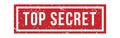 Top secret rubber stamp in rectangular form. Grunge seal with red pigment or dye for confidentual documents Royalty Free Stock Photo