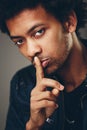 Top secret. man holding finger on his lips Royalty Free Stock Photo