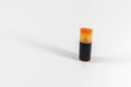 Top shoot of orange colored highlighter pen with white background