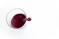 Top shot, close up of fresh sweet cherry with water drops, cherry juice in glass isolated on white background, selective focus,