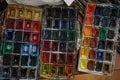 Top shot of heavily used watercolor box palette by professional artist