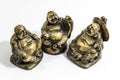 Top shot of small 3 chinese monk figures which are peace, health, happiness