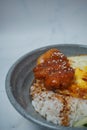 Top Side View And A Close Up Of A Food Bowl Filled With Rice, Chicken, omelet, shrimp. Grey Bowl. White Background