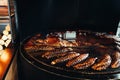 A top sirloin steak flame broiled on a barbecue, shallow depth of field Royalty Free Stock Photo