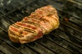 A top sirloin steak flame broiled on a barbecue shallow depth of field. Royalty Free Stock Photo