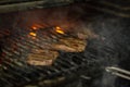 A top sirloin steak flame broiled on a barbecue Royalty Free Stock Photo