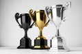 Top 3 spots winners trophies gold, silver and bronze in white background. Created with Generative AI technology. Royalty Free Stock Photo