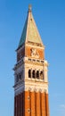 Top of St Mark`s Campanile on Sky Background. Bell Tower of St Mark`s Basilica in Venice Royalty Free Stock Photo