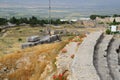 top of the steps of the amphitheater, stones and boulders on the hill