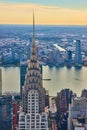 Top of stunning New York City skyscraper vertical overlooking river and city