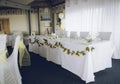A top table at a wedding reception laid out for a wedding breakfast Royalty Free Stock Photo