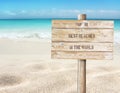 Top ten beaches in the world message on the sign board on the tropical white sandy beach background