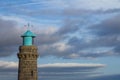 Teignmouth lighthouse with a cloudy sky Royalty Free Stock Photo