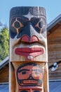 Top of totem pole features mask, Ketchikan, Alaska, USA Royalty Free Stock Photo