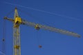 Top of tower crane against blue sky background Royalty Free Stock Photo