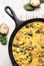 Top vertical view of baked egg fritatta with spinach Royalty Free Stock Photo