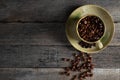 Top view above of Black coffee seed for morning menu in brown ceramic cup Royalty Free Stock Photo