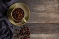 Black coffee seed for morning menu in brown ceramic cup with coffee beans roasted Royalty Free Stock Photo