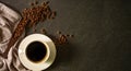 Top view above of Black hot coffee for morning with milk foam for morning menu in white ceramic cup with coffee beans roasted and Royalty Free Stock Photo