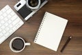 Top view above of office desk table with keyboard computer and book and old camera. Business and finance concept. Workplace. Flat Royalty Free Stock Photo