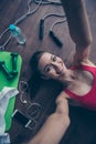 Top-view above photo of young pretty girl relaxing after gym exercises making selfie