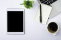 Top view above of tablet blank monitor black screen on white office desk table Royalty Free Stock Photo