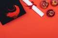 Top view of academic cap, diploma and apples on red surface. Royalty Free Stock Photo