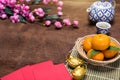 Top view accessories Chinese new year festival,leaf,wood basket,red packet,plum blossom Royalty Free Stock Photo