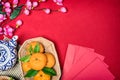 Top view accessories Chinese new year festival,leaf,wood basket,red packet,plum blossom Royalty Free Stock Photo