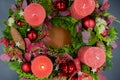 Top view of advent wreath with one red burning candle on gray background Royalty Free Stock Photo