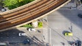 Top view aerial of a driving car on asphalt track and pedestrian crosswalk in traffic road with light and shadow silhouette with