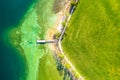 Top view aerial drone photo of stunning colored lake Tegernsee beach with crystalline water. Aerial from above