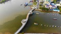 Top view aerial view love bridge or Ninh Kieu quay of downtown in Can Tho City, Vietnam with development buildings, transportation